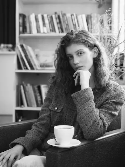 The photo of me enjoying the cup of coffee.